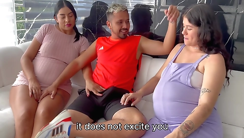 Two pregnant women are getting fucked in a threesome