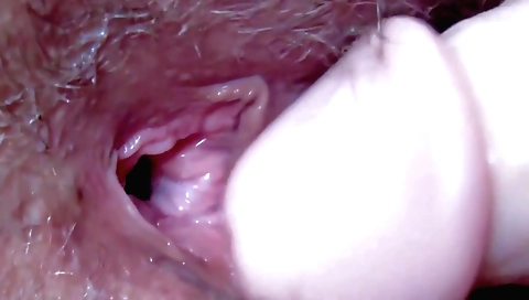 Hairy girl plays with her hairy pussy and masturbates