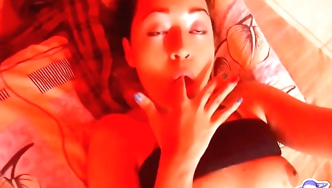 Sexy brunette 18+ woman in the green room fucking herself