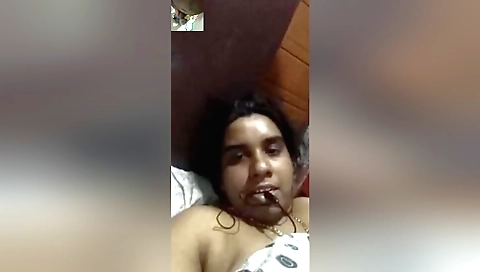 Mallu bhabhi stretches her legs and moans as she fucks herself