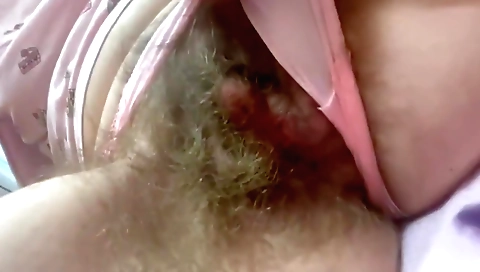 Hairy indian babe tries to watch porn in a solo scene