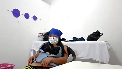 Nurse is stripping and showing us her sexy legs and ass
