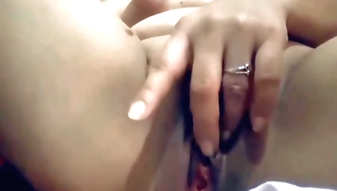 Busty brunette fingering a dildo in her bikini in webcams