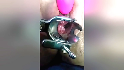 Solo female gets a toy in her pussy in front of camera