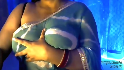 Sexy brunette shows off her beautiful boobs in webcam