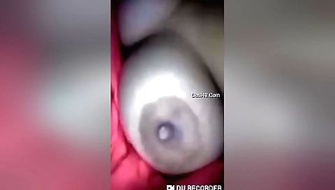 Busty brunette shows her big boobs on webcam video