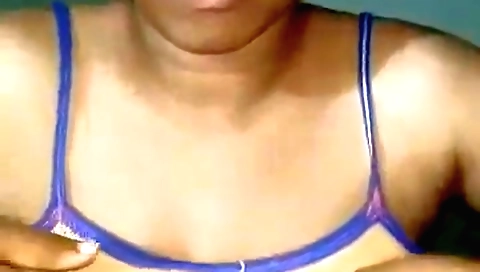 Hot brunette beauty is showing her body in web camera video