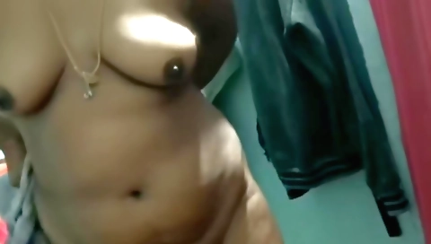 Indian girl wearing a bikini with her tits wide apart