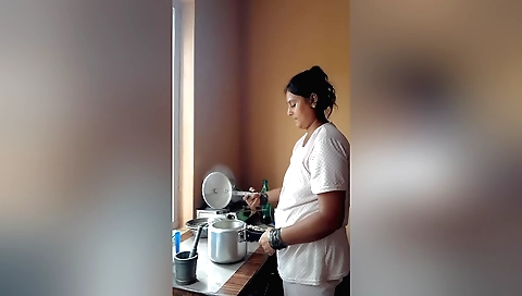Indian mature woman with a big booty in a video show
