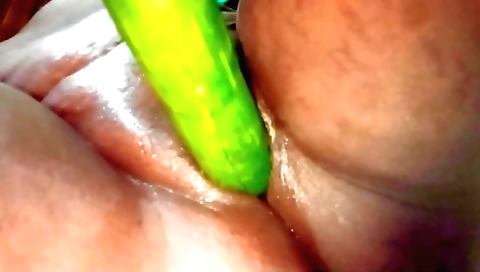 Indian wife with a sexy pussy fucked by a cucumber