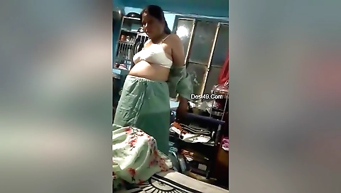 Indian slut in hot clothes is playing in the webcam video