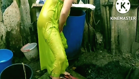 Indian bathgirl in a tight bikini is in a hot shower