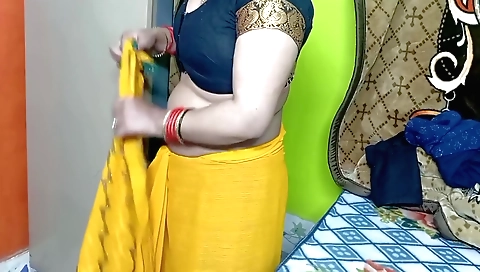 Indian chick in yellow scarf shows off the beautiful tits