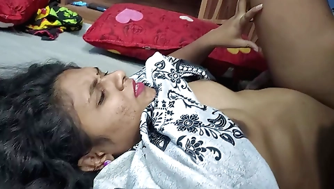 Curly-haired lady in red dress has sex in the bedroom