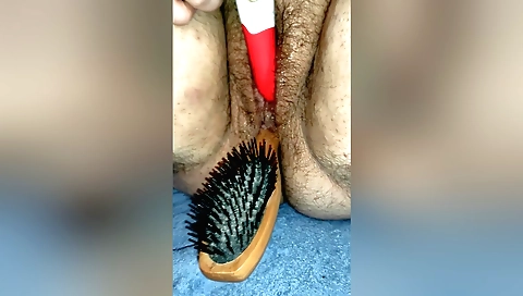 Indian amateur masturbates with vibrator in a hairy pussy