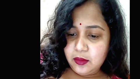 Busty Indian whore is masturbating alone on her bed