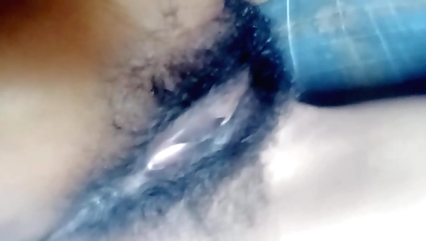 Indian slut is showing her hairy pussy in homemade video