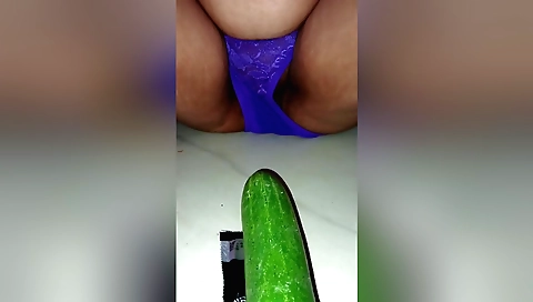 Indian amateur sex scene with girl sucking a cucumber