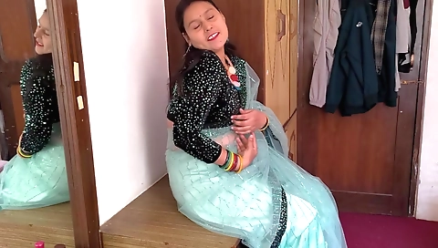 Indian girl in sexy white dress before the holi ceremony