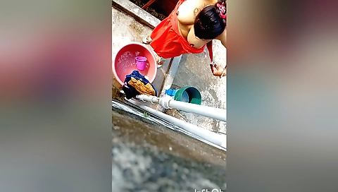 Indian brunette babe gets wet on her body in solo sex video