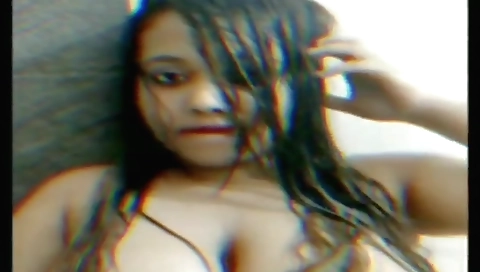 Indian brunette with big tits playing with her fingers