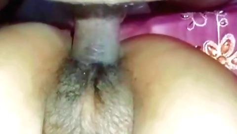 Indian girl with hairy pussy and a hot smile at the studio