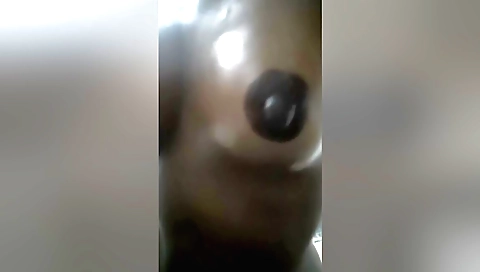 Indian babe with large boobs giving a handjob to a guy