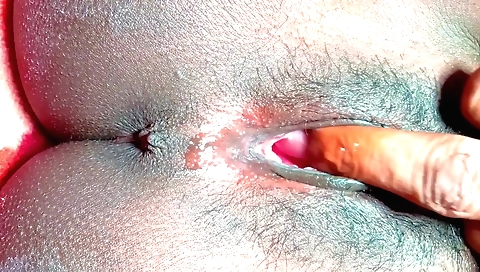 Indian girl in a long skirt fucks herself in a solo video