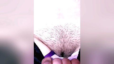 Indian girl is making a homemade video with a vibrator