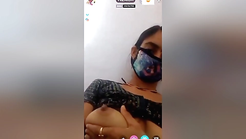 Sexy brunette bhabhi shows her boobs in front of the camera
